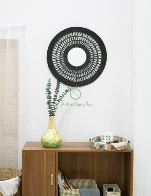 Black round open weave seagrass mirror for wall decor