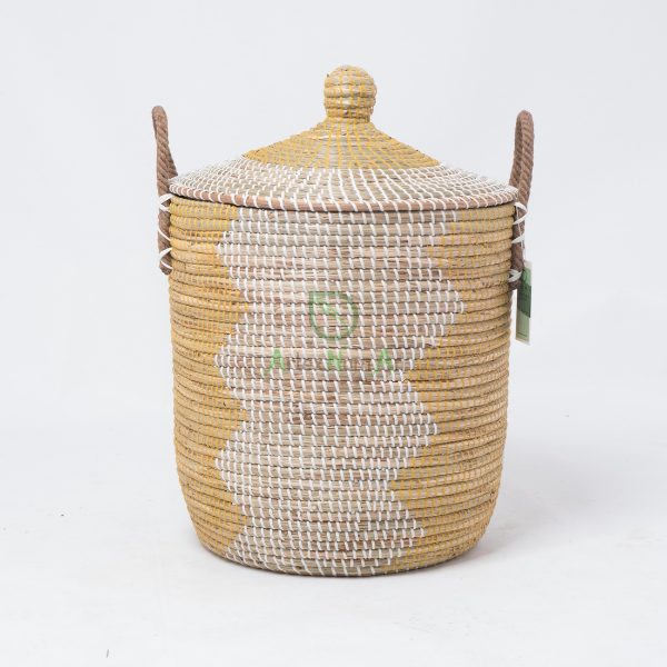 Yellow coiled seagrass wicker laundry hamper 