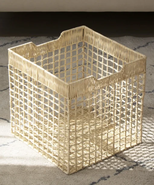 Wholesale Modern Rattan Folding Storage Cube Basket in off white for clutter free storage on Ikea Kallax shelves and in office, kitchen and bathroom spaces. Low MOQ with options for OEM/ODM and private label for retailers, wholesalers, sourcing agents and HORECA buyers.