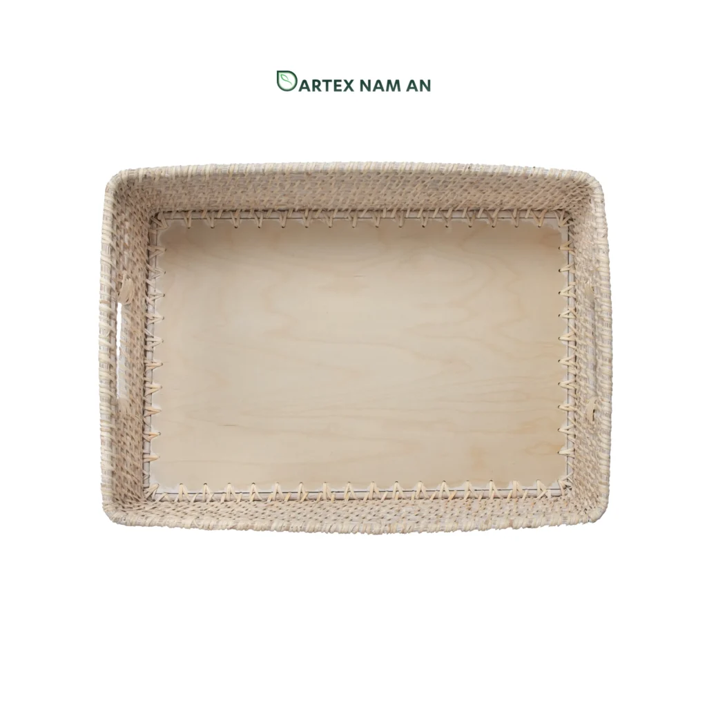 Optimize your organizational inventory with our premium shallow rectangular Wholesale Rattan Basket. Features an elegant whitewashed finish, integrated side handles, and a smooth, solid bamboo base insert. Ideal for HORECA table service, corporate desk sorting, and minimalist home retail displays. Bulk sourcing ready.