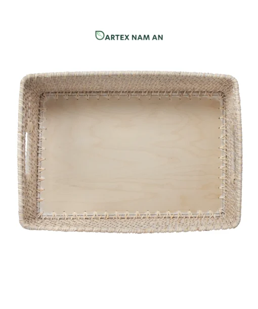 Optimize your organizational inventory with our premium shallow rectangular Wholesale Rattan Basket. Features an elegant whitewashed finish, integrated side handles, and a smooth, solid bamboo base insert. Ideal for HORECA table service, corporate desk sorting, and minimalist home retail displays. Bulk sourcing ready.