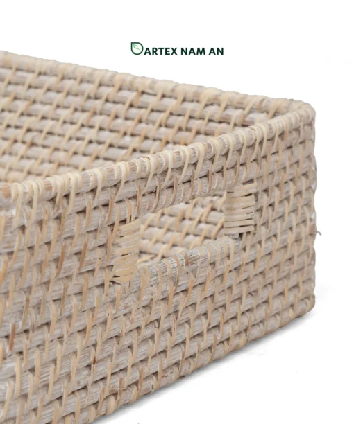 Optimize your organizational inventory with our premium shallow rectangular Wholesale Rattan Basket. Features an elegant whitewashed finish, integrated side handles, and a smooth, solid bamboo base insert. Ideal for HORECA table service, corporate desk sorting, and minimalist home retail displays. Bulk sourcing ready.