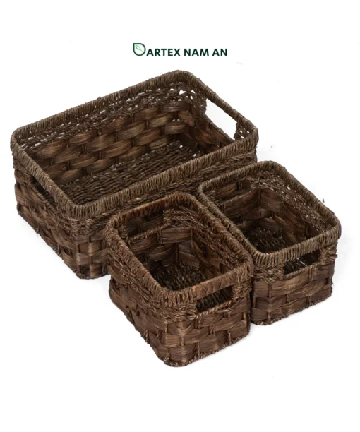 Optimize your shelf displays with our 3-piece nesting Wholesale Storage Basket set. Handwoven from natural dark brown seagrass and water hyacinth. Features 1 large basket and 2 companion insert bins. Ideal for HORECA amenities, corporate office sorting, and retail inventory. Bulk pricing available.