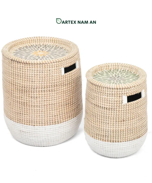Expand your inventory with our eco-friendly Wholesale Rattan Basket set of 2. Featuring artisanal two-tone handweaving and decorative floral inlay lids. High-quality, premium-grade storage solution for HORECA, corporate offices, and home retail. Bulk order ready.