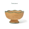 Expand your inventory with our Wholesale pedestal bowl. Handwoven from natural rattan featuring a wavy scalloped rim and green accent trim for HORECA buffets, corporate offices, and lifestyle retail. Bulk order ready.