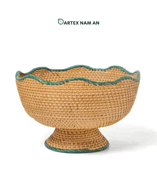 Expand your inventory with our Wholesale pedestal bowl. Handwoven from natural rattan featuring a wavy scalloped rim and green accent trim for HORECA buffets, corporate offices, and lifestyle retail. Bulk order ready.
