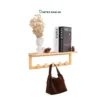 Optimize vertical wall space with our natural bamboo Wholesale Wall Shelf. Features a floating display ledge and hanging peg hooks for towels, coats, HORECA guest rooms, and offices. Bulk order ready.