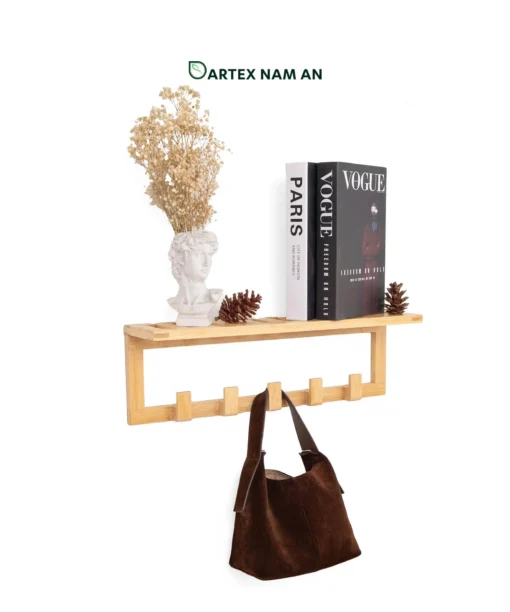 Optimize vertical wall space with our natural bamboo Wholesale Wall Shelf. Features a floating display ledge and hanging peg hooks for towels, coats, HORECA guest rooms, and offices. Bulk order ready.