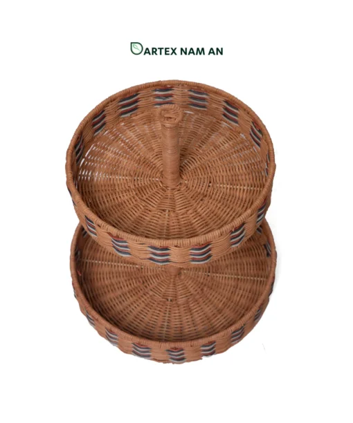 Maximize vertical table presentation with our 2-tier Wholesale Serving Tray. Handwoven from natural rattan with a multi-tone rim pattern and central ring handle for HORECA buffets, corporate offices, and lifestyle home retail. Bulk order ready.