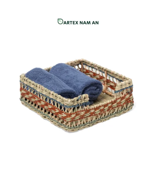 Organize tables and vanities with our square natural seagrass Wholesale Basket. Handwoven with colorful accents and a front cutout for HORECA, offices, and home retail. Bulk order ready.