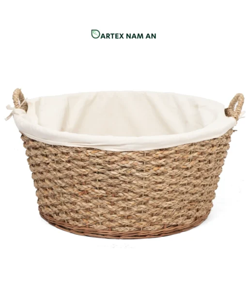 Streamline linen management with our handwoven seagrass Wholesale Laundry Basket. Features chunky rope weave, removable canvas liner, and dual handles. Bulk trade ready.